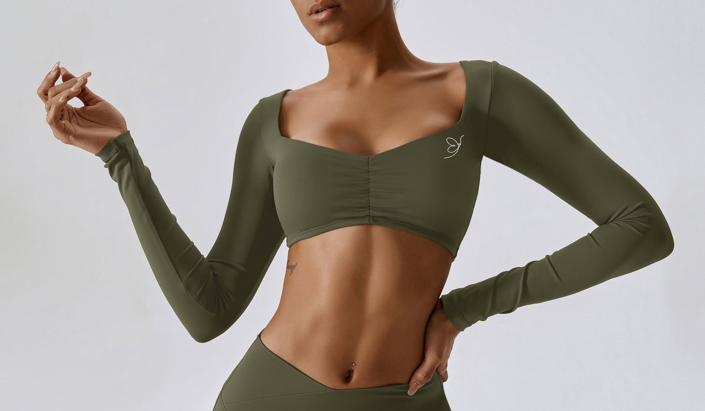 Fitliz Stylish Top: Lightweight and chic activewear for confident workouts. Crafted from comfortable and breathable nylon-spandex blend."