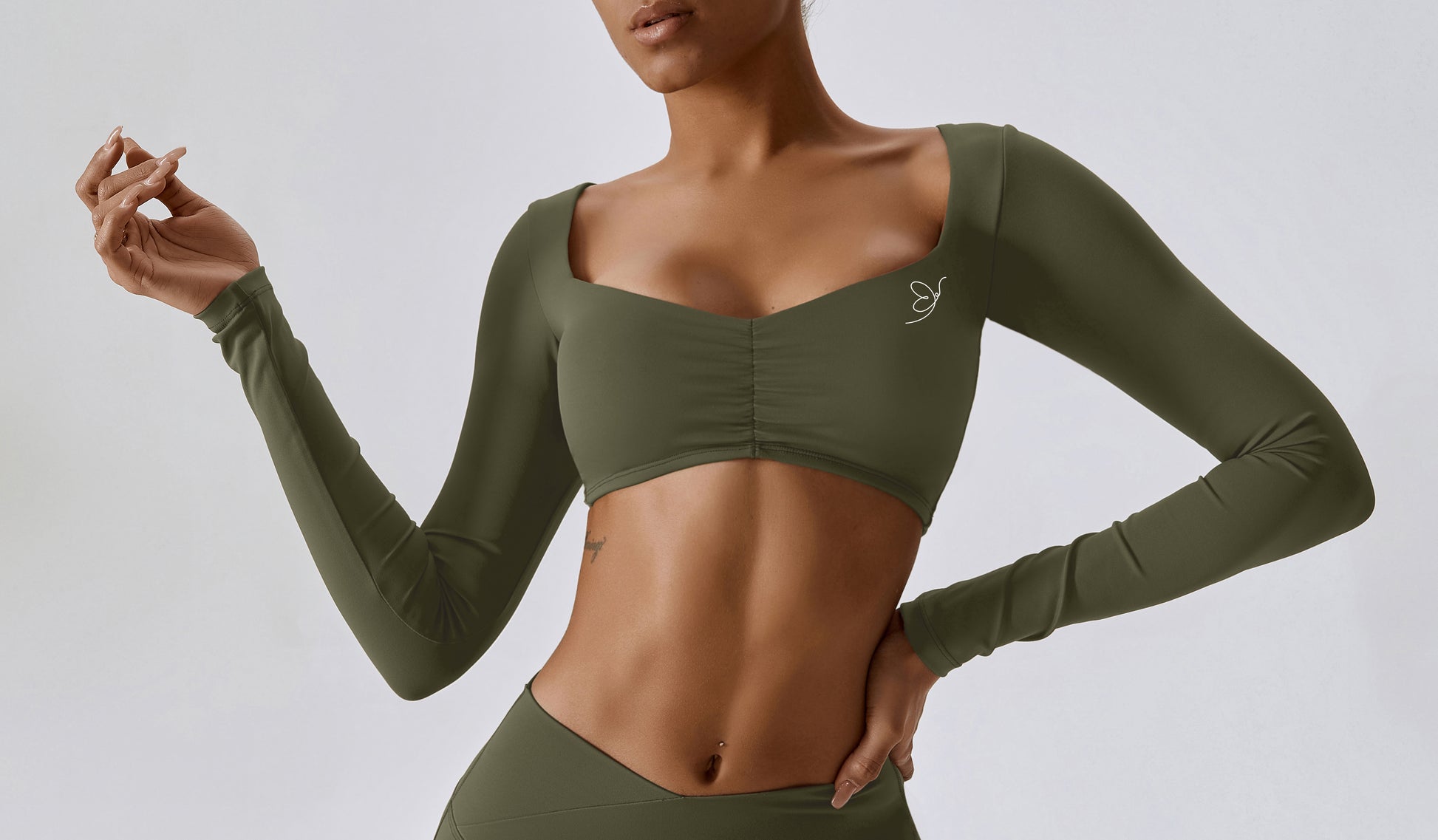 Fitliz Stylish Top: Lightweight and chic activewear for confident workouts. Crafted from comfortable and breathable nylon-spandex blend."